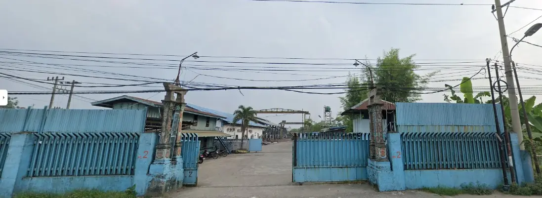 Entrance gate and office of the company workshop in Medan